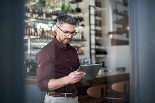 Man looking at tablet